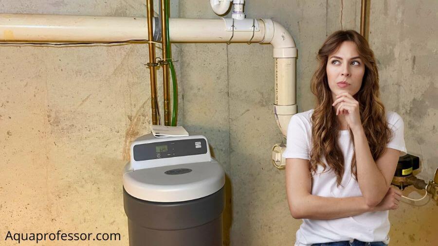 How to remove brown sludge in water softener tank